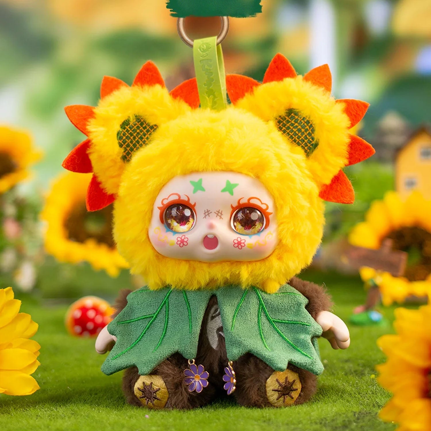 Plush toy resembling a sunflower character with a blurred floral background