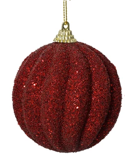 Red glittery Christmas ornament with a gold chain on a white background