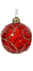 Red glass ornament with gold top and silver glittery accents on a white background