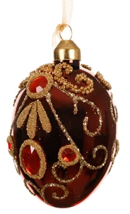 Three luxury egg-shaped glass Christmas baubles with enamel finish, decorated with gold glitter, red beads, and diamond accents – assorted red, oxblood, and fig tones.