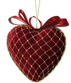 Assorted velvet heart-shaped Christmas ornaments with gold lace and bows