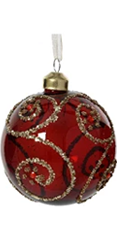 Decorative red ornament with gold accents on a white background