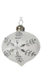 Decorative white ornament with silver snowflake design on a white background