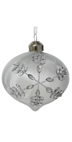 Decorative glass ornament with floral patterns on a white background