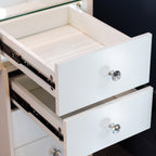 White vanity drawers with crystal-style round knobs, shown with two upper drawers open to reveal the interior storage space.