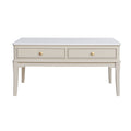 Monroe Coffee Table in Stone - full view console table with two drawers, each featuring a round gold pull knob, set against a solid white background.