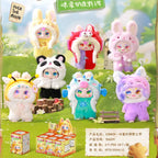 Colorful plush toys with animal-themed costumes on a grassy background