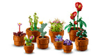 Set of LEGO cacti and flowers in pots on a white background