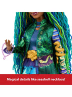 Doll with green and blue hair, colorful outfit, and seashell necklace on a white background.