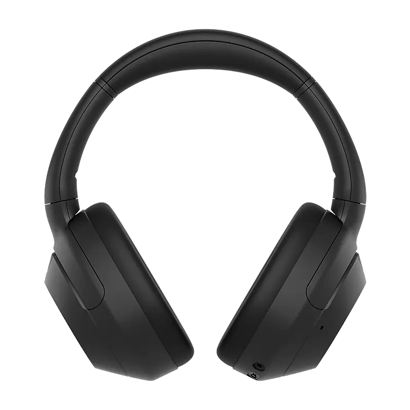 Black over-ear headphones on a white background side view