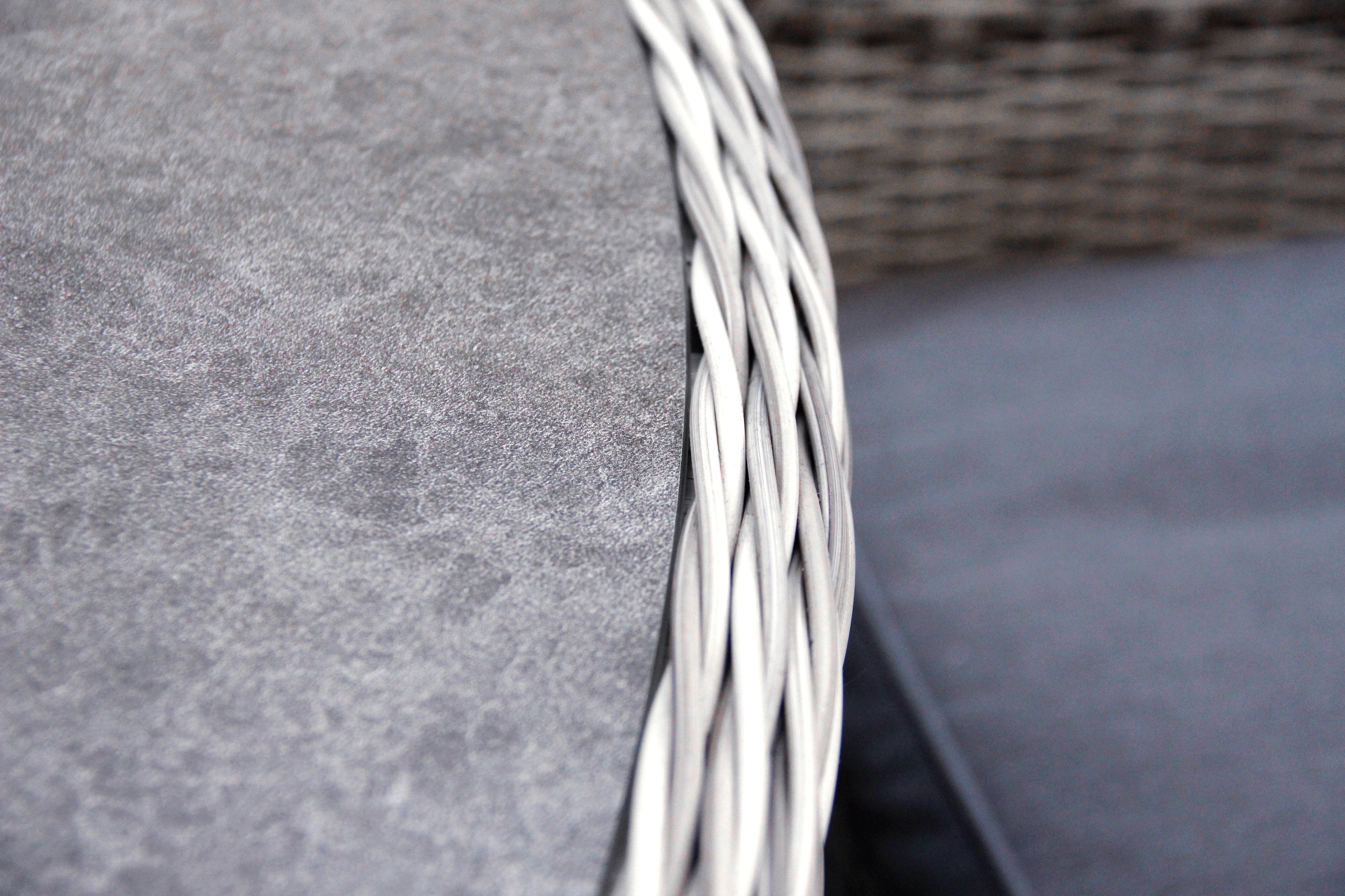 Close-up of a woven basket corner with a textured surface.