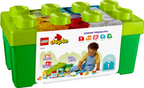 LEGO Duplo Learning Through Play 10913 building toy storage box in green and lime green, featuring a white front label with product information and a child playing with blocks.