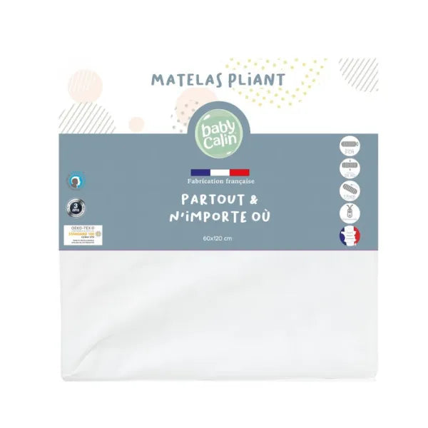 Baby Calin foldable mattress packaging with a blue-gray label and white mattress visible underneath, on a white background.