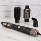 Remington hair styling tool with attachments on a marble surface