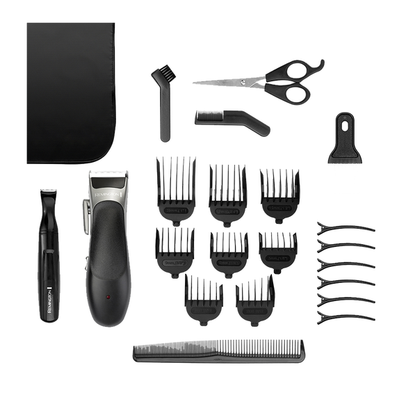 Set of grooming tools including a hair clipper, scissors, and multiple attachments on a white background.