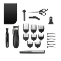 Set of grooming tools including a hair clipper, scissors, and multiple attachments on a white background.