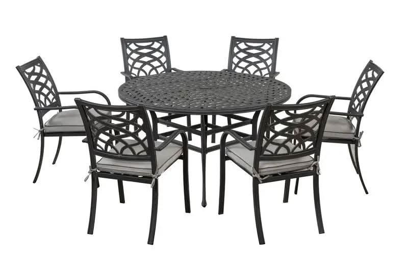 A 7-piece outdoor patio dining set featuring a round metal table and five matching armchairs with lattice backs and light gray cushions, shown on a plain white background.