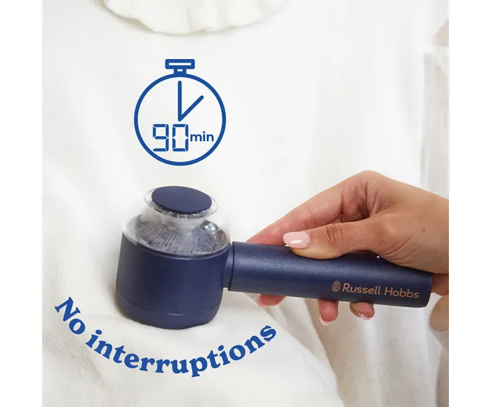 Hand holding a Russell Hobbs kitchen tool with a timer graphic and 'No interruptions' text on a white background.