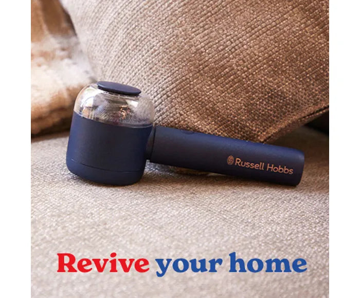Blue Russell Hobbs device on a carpet with 'Revive your home' text