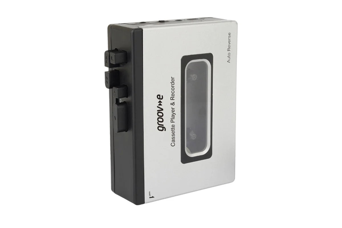 A silver and black Groove cassette player and recorder device with a transparent window showing the internal tape mechanism, set against a plain white background.