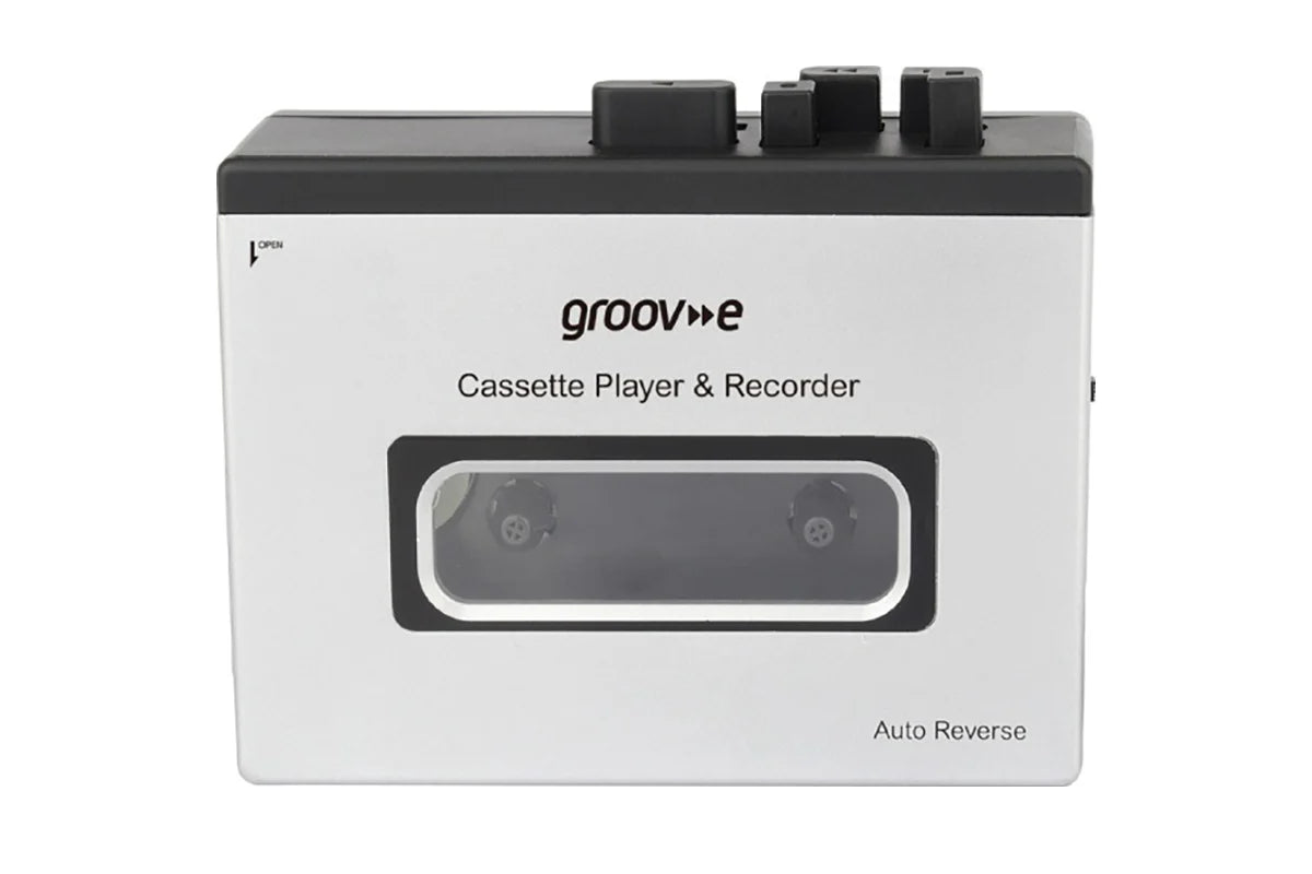 A white and black Groovee cassette player and recorder device with a transparent window showing the internal tape reels, set against a plain white background.