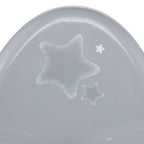 A close-up of a light gray plastic surface with two frosted star decals, one large and one small, on a white background.