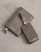 Luggage Tag 'The World Is Your Oyster' in Pewter