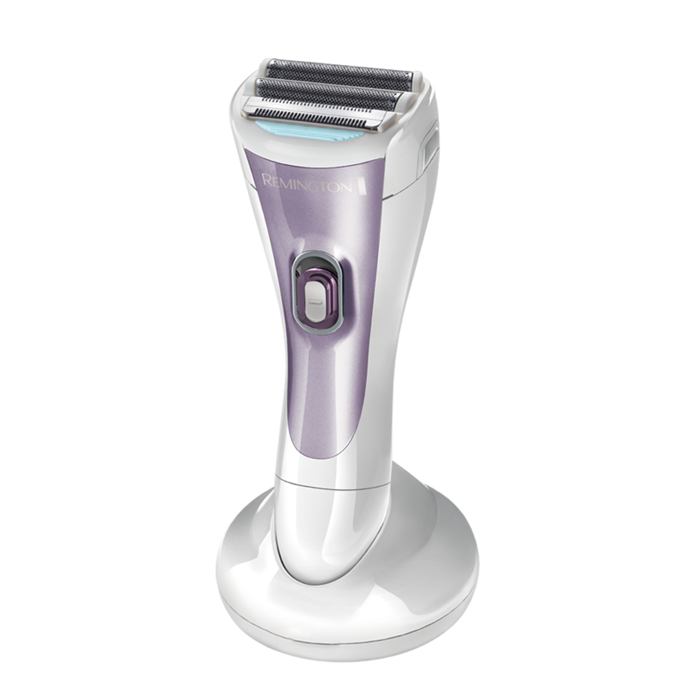 Purple and silver electric shaver on a white background