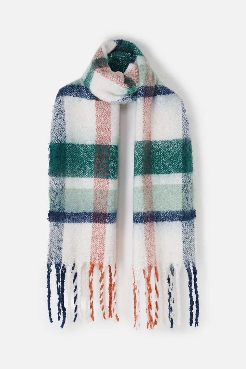 A soft, fuzzy plaid scarf with fringe ends, featuring a pattern of white, dark green, light blue, and muted orange on a clean white background.