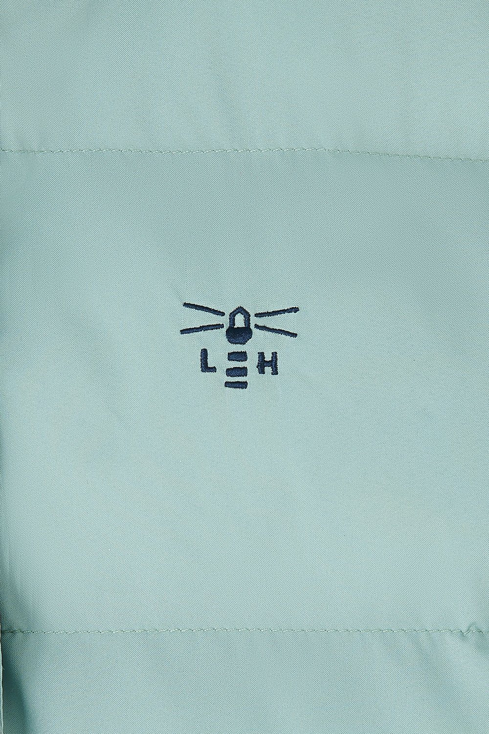 Light blue jacket with a logo on the chest
