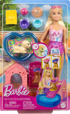 Barbie toy set with doll, pets, and accessories in packaging