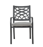 A dark gray metal dining chair with a decorative lattice backrest and a light gray cushioned seat, shown against a plain white background.