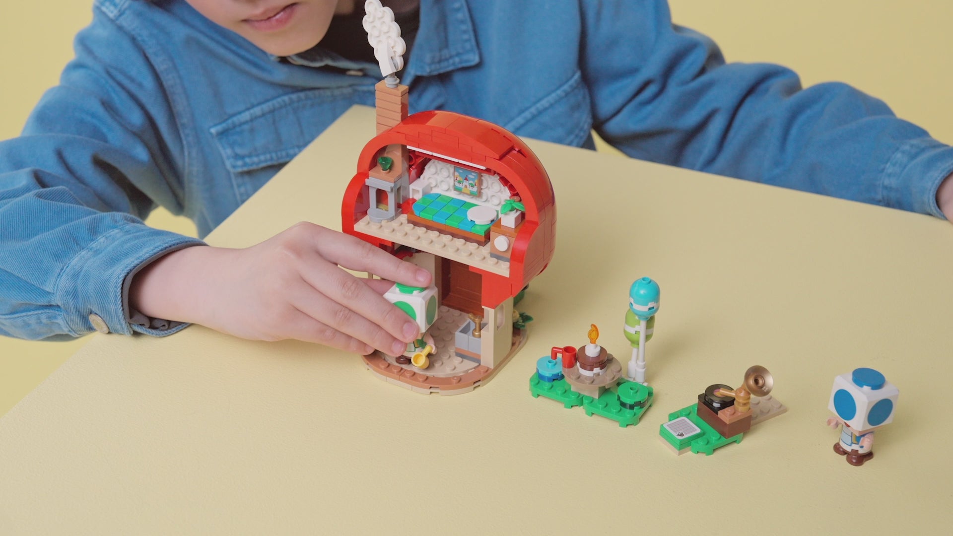 LEGO Super Mario Party at Toad’s House set (72041) with Blue Toad and Green Toad figures, gramophone, picnic table, kitchen, bedroom and party accessories