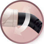 Close-up of a black and white object on a pink background