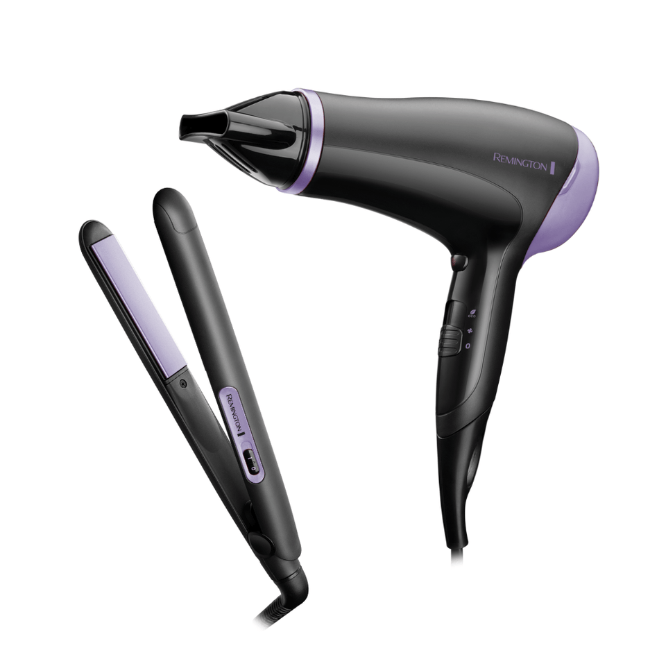 Black and purple hair dryer and straightener on a white background