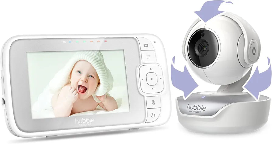 Baby monitor with screen displaying a baby and camera on the side.
