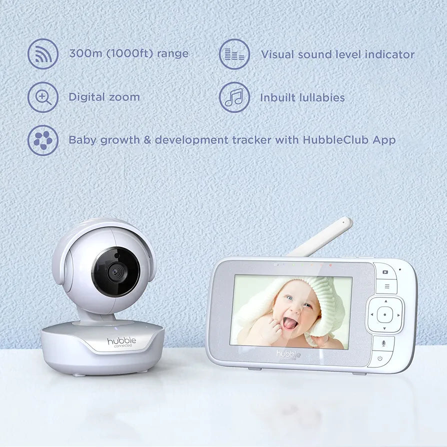 Baby monitor with camera and display on a light blue background