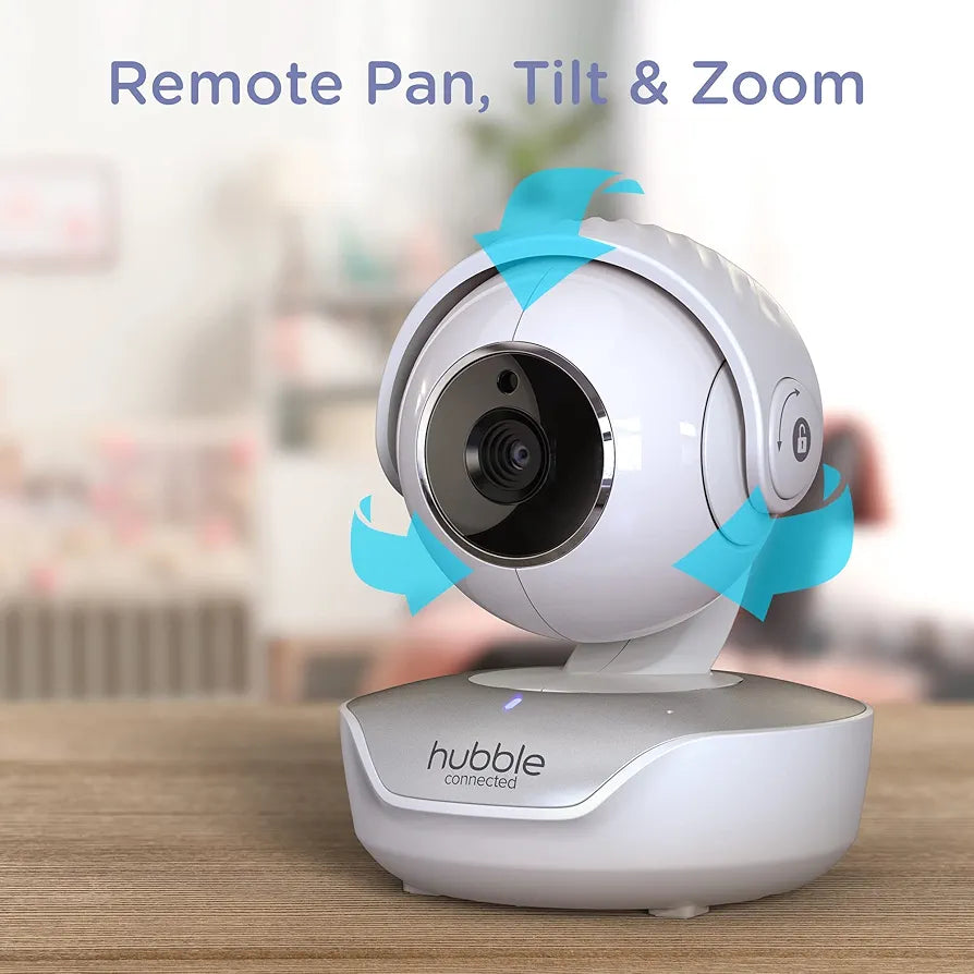Hubble connected camera with remote pan, tilt, and zoom features on a wooden surface.