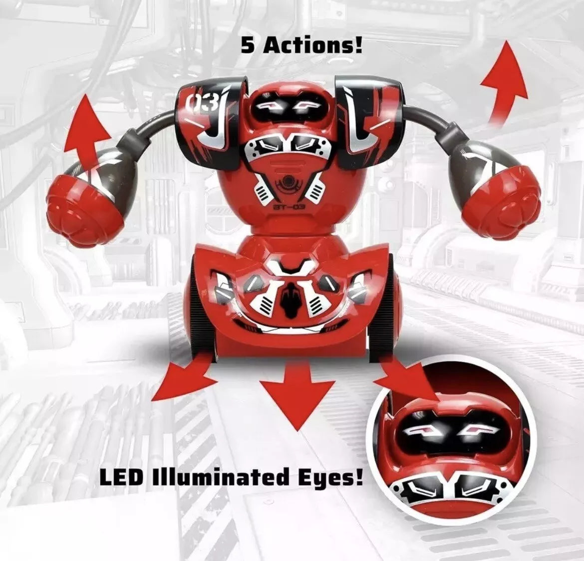 Red toy robot with LED illuminated eyes on a white background