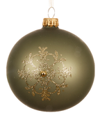 Green Christmas ornament with gold snowflake design on a white background