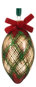 Decorative ornament with plaid pattern and red bow on a white background