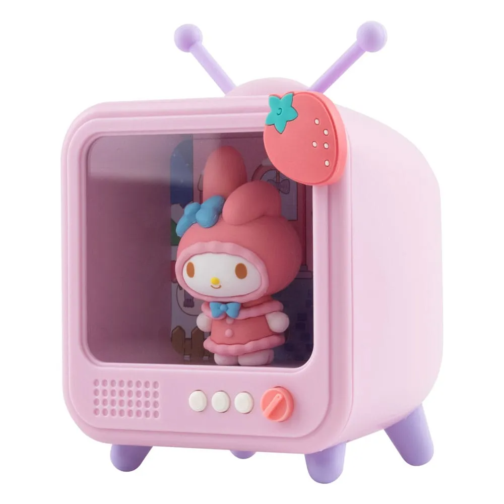 Pink toy television with a small character from Sanrio inside on a white background