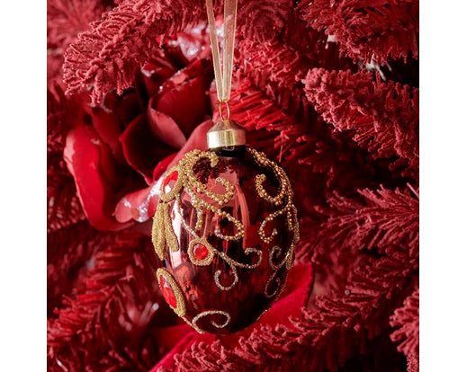 Three luxury egg-shaped glass Christmas baubles with enamel finish, decorated with gold glitter, red beads, and diamond accents – assorted red, oxblood, and fig tones.