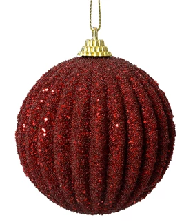 Red glittery Christmas ball ornament on a white background