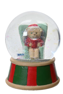 Snow globe with a teddy bear in a Santa outfit on a white background