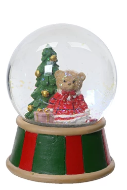 Christmas-themed snow globe with a bear and tree inside, on a white background
