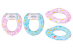 Three First Species brand soft toilet training seats shown on a white background, featuring pink and blue ocean and unicorn patterns.