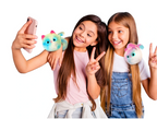 Two children with colorful pomsie toys taking a selfie on a white background
