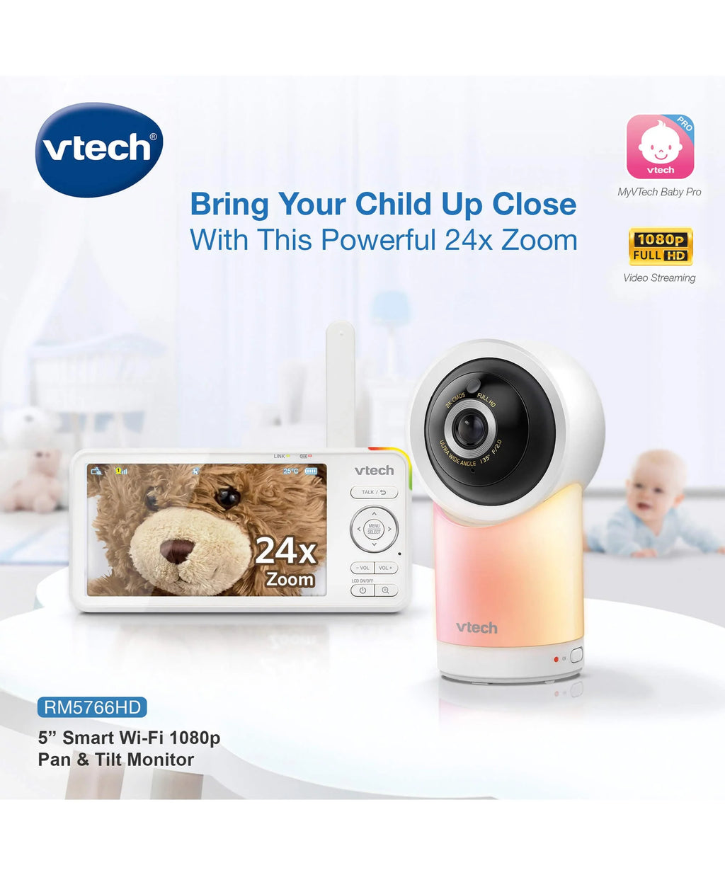A Vtech wireless baby monitor and camera set shown on a clean white background with promotional text. The set includes a white handheld monitor with a screen displaying a teddy bear photo and a white/orange cylindrical security camera.