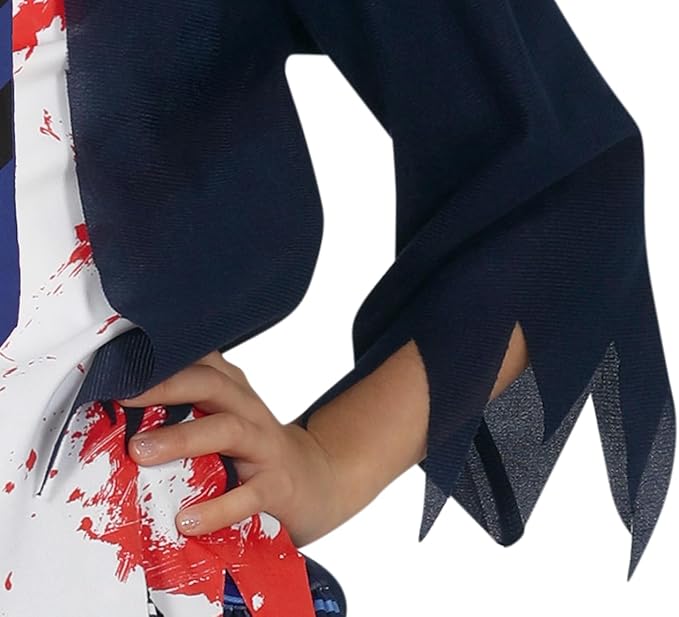 Close-up of a hand holding a kimono with a navy blue sleeve and red and white patterned fabric.